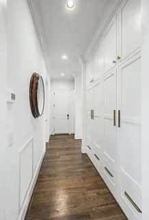 a spacious bathroom with a granite countertop sink and a window