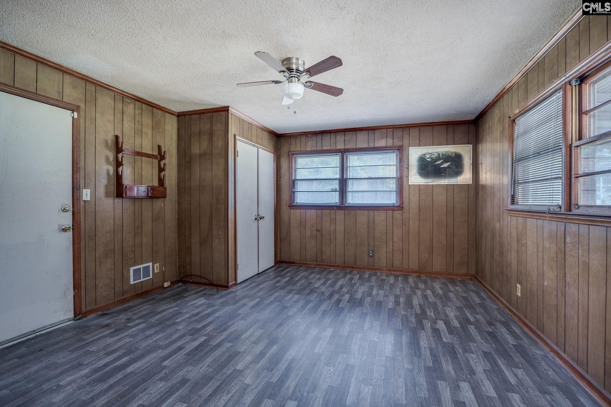 5666 Middleton Court Columbia, SC 29203 - Photo 23 of 42 wooden floor in an empty room with a window