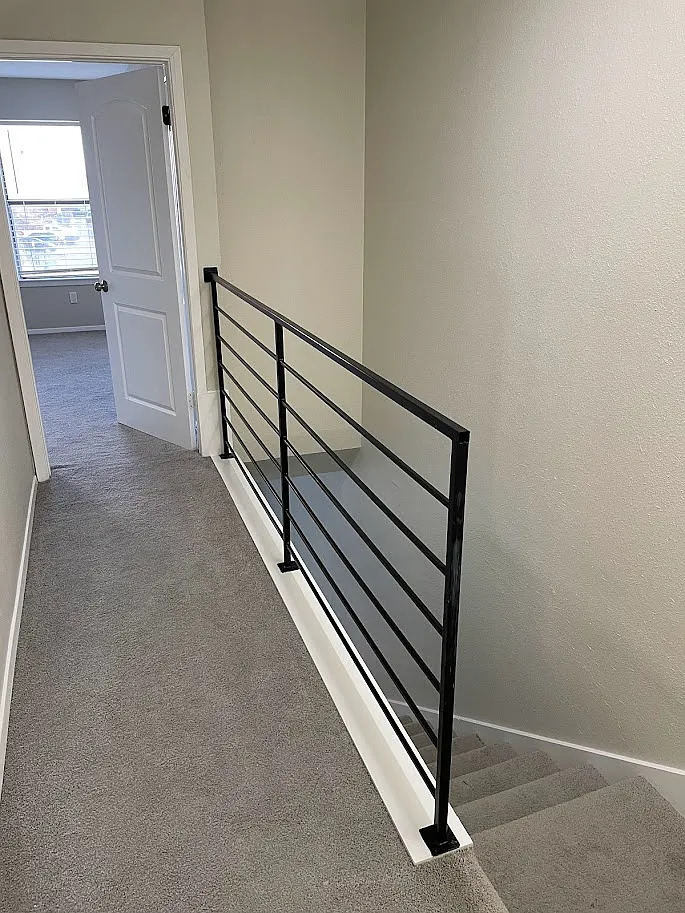 2018 West Rundberg Lane, Unit 16C Austin, TX 78758 - Photo 11 of 12 a view of a hallway with stairs