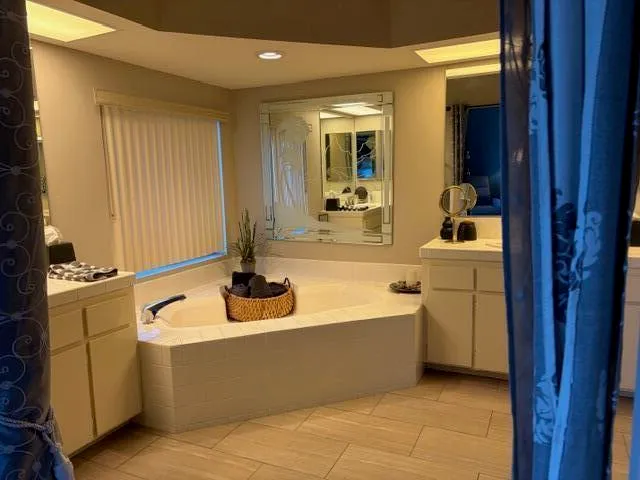 a view of a kitchen with a sink and living room