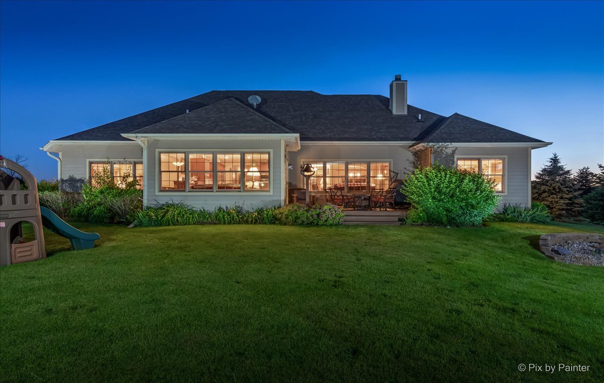 7306 Bob-O-Link Road Spring Grove, IL 60081 - Photo 2 of 14 a front view of a house with a yard