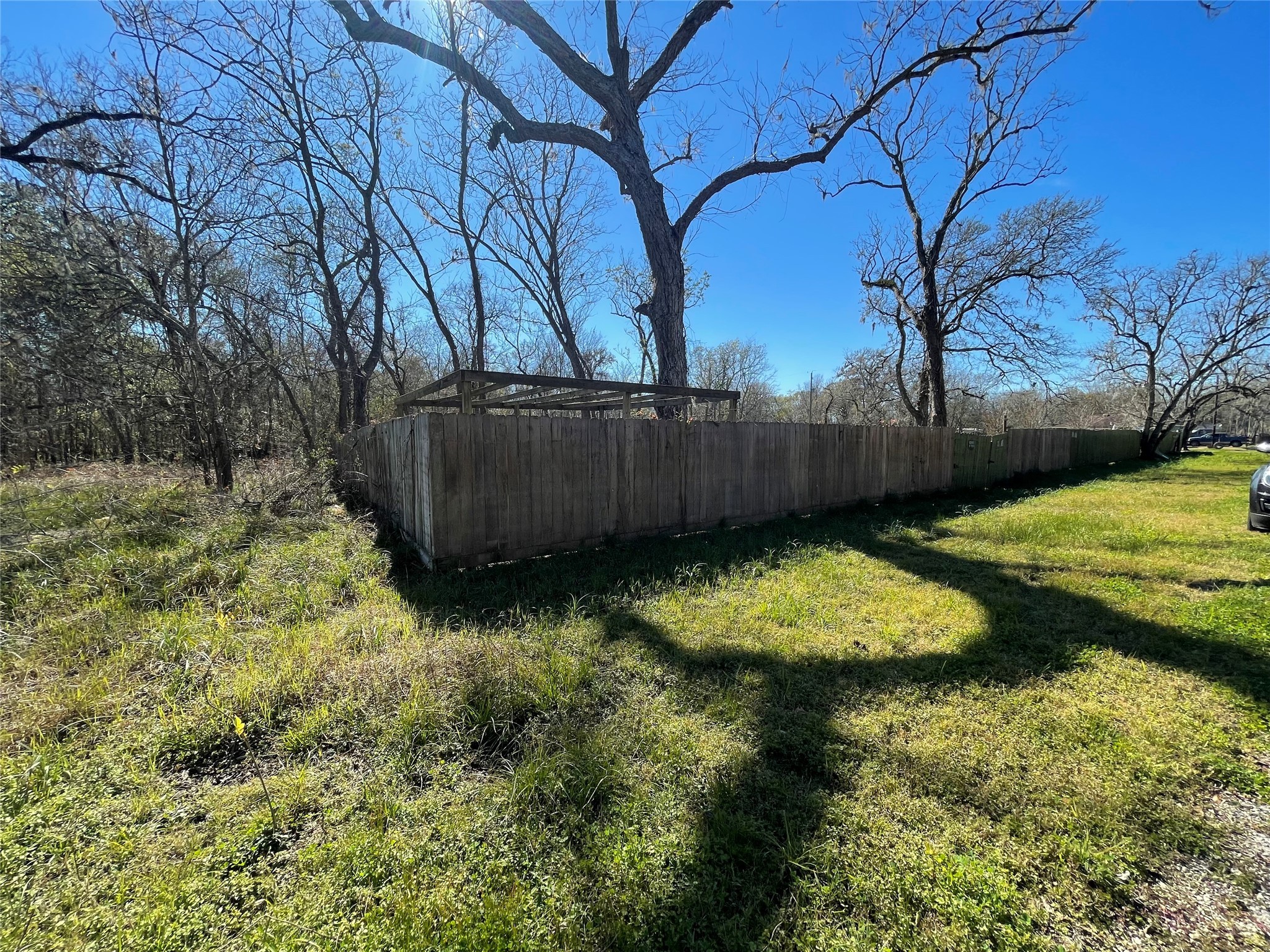 205 Sitka Drive Angleton, TX 77515 - Photo 3 of 6 a view of a backyard