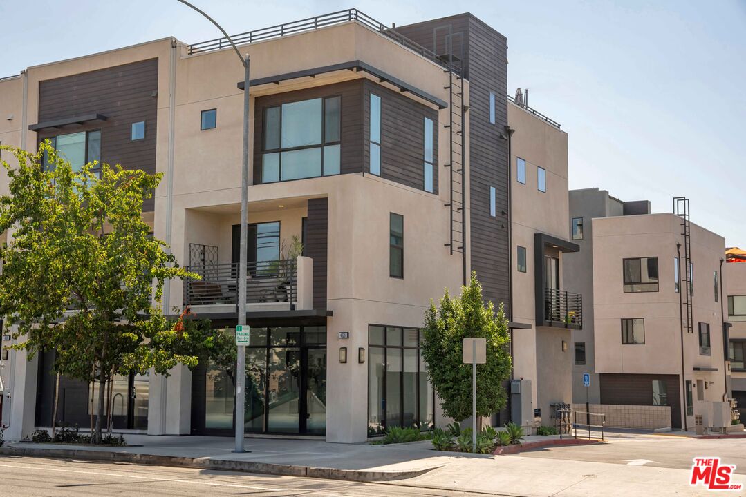 4326 Eagle Rock Boulevard Los Angeles, CA 90041 - Photo 1 of 33 a front view of a building with a garden
