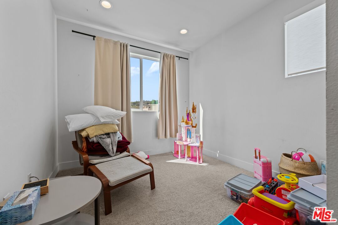 4326 Eagle Rock Boulevard Los Angeles, CA 90041 - Photo 19 of 33 a room with furniture and a window