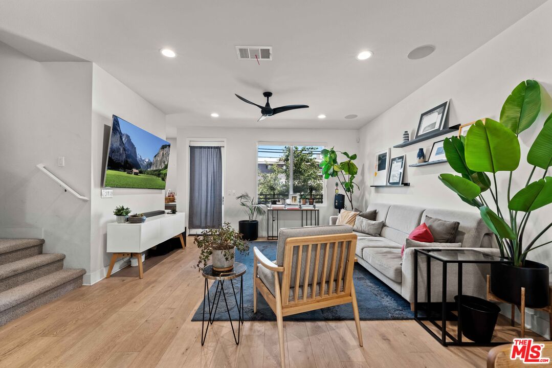 4326 Eagle Rock Boulevard Los Angeles, CA 90041 - Photo 2 of 33 a living room with furniture and a potted plant