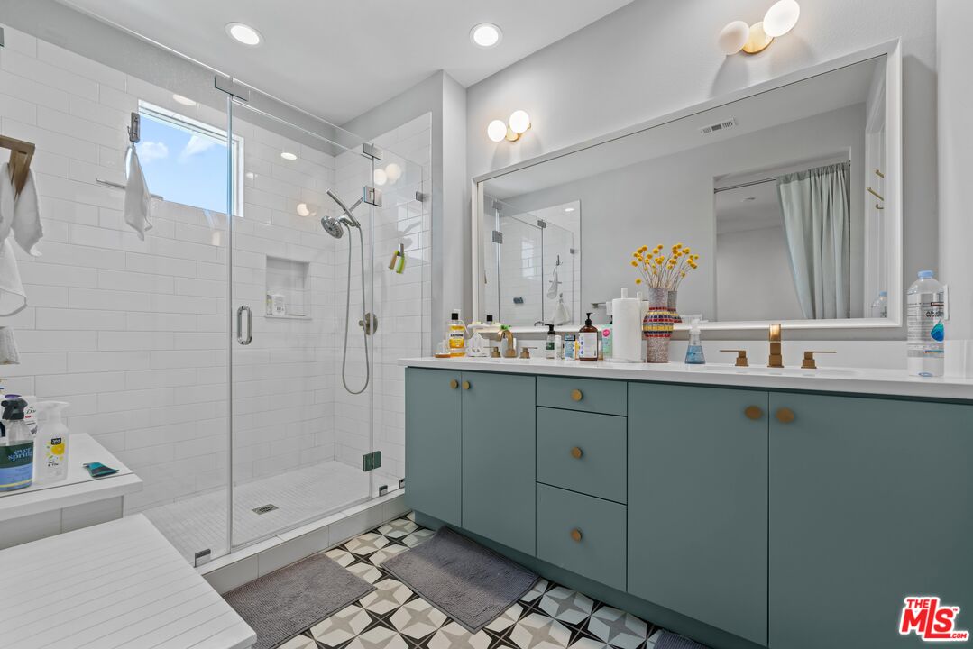 4326 Eagle Rock Boulevard Los Angeles, CA 90041 - Photo 23 of 33 a bathroom with a shower sink and mirror