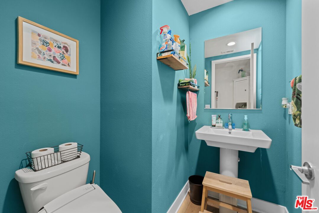 4326 Eagle Rock Boulevard Los Angeles, CA 90041 - Photo 27 of 33 a bathroom with a toilet sink and mirror