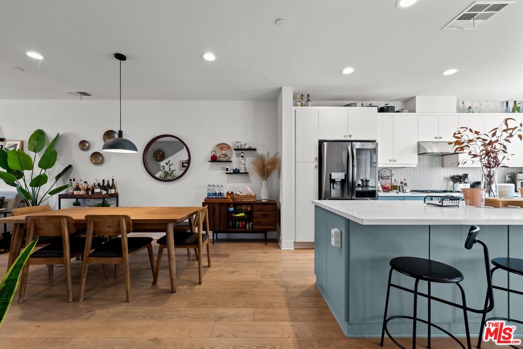 4326 Eagle Rock Boulevard Los Angeles, CA 90041 - Photo 3 of 33 a kitchen with a dining table and chairs