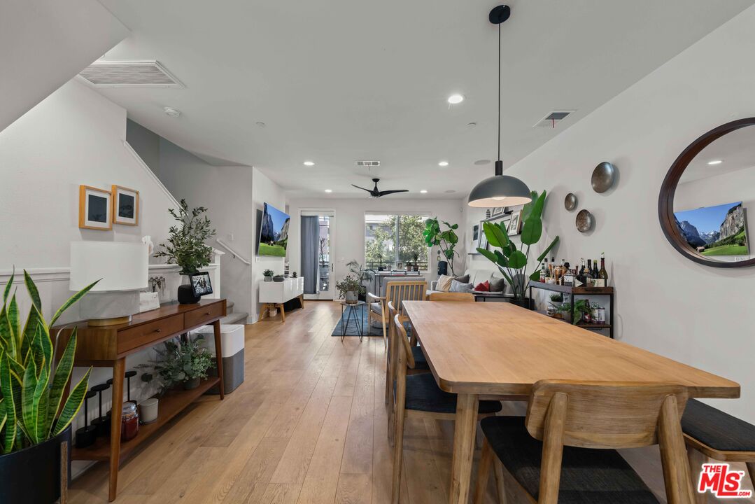 4326 Eagle Rock Boulevard Los Angeles, CA 90041 - Photo 6 of 33 a view of a dining room with furniture and wooden floor