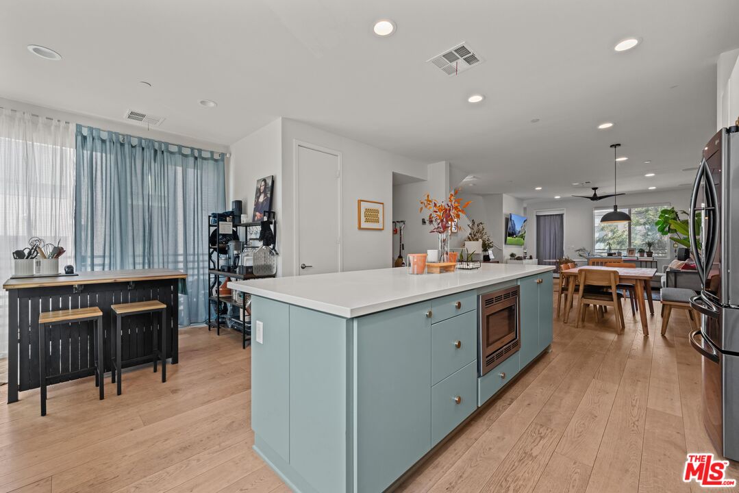 4326 Eagle Rock Boulevard Los Angeles, CA 90041 - Photo 7 of 33 a kitchen with a sink a counter top space and appliances