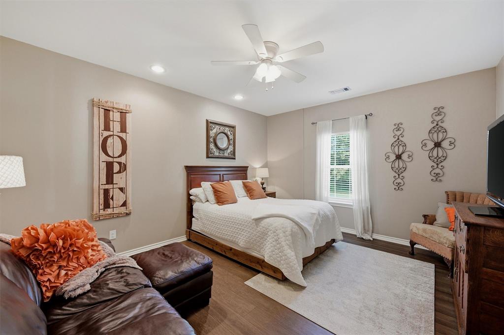 15656 South State Highway 78 Blue Ridge, TX 75424 - Photo 17 of 36 a bedroom with a bed couch and window