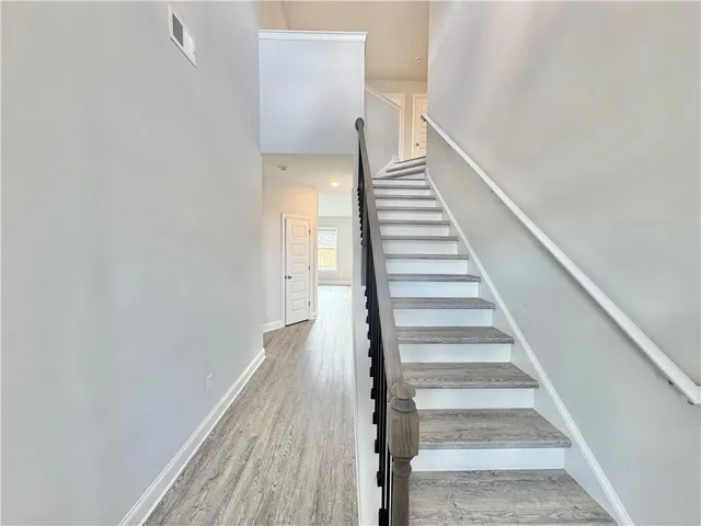 a view of entryway with wooden floor