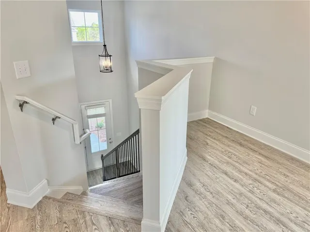 a view of a hallway view with staircase