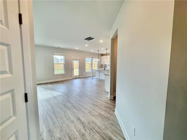 a view of livingroom and hardwood floor