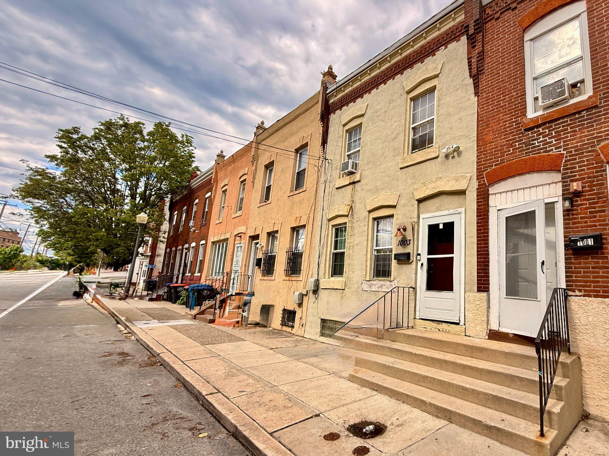 1003 Madison Street Chester, PA 19013 - Photo 1 of 30 a view of a building with a street