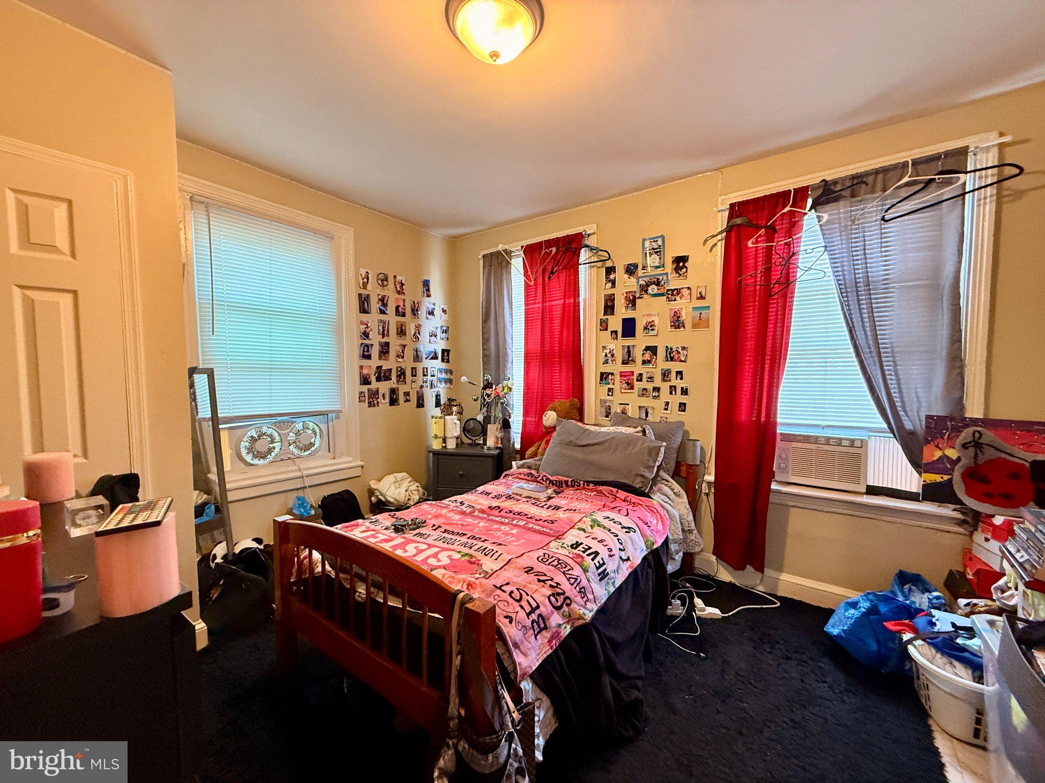 1003 Madison Street Chester, PA 19013 - Photo 20 of 30 a bedroom with a bed and a window