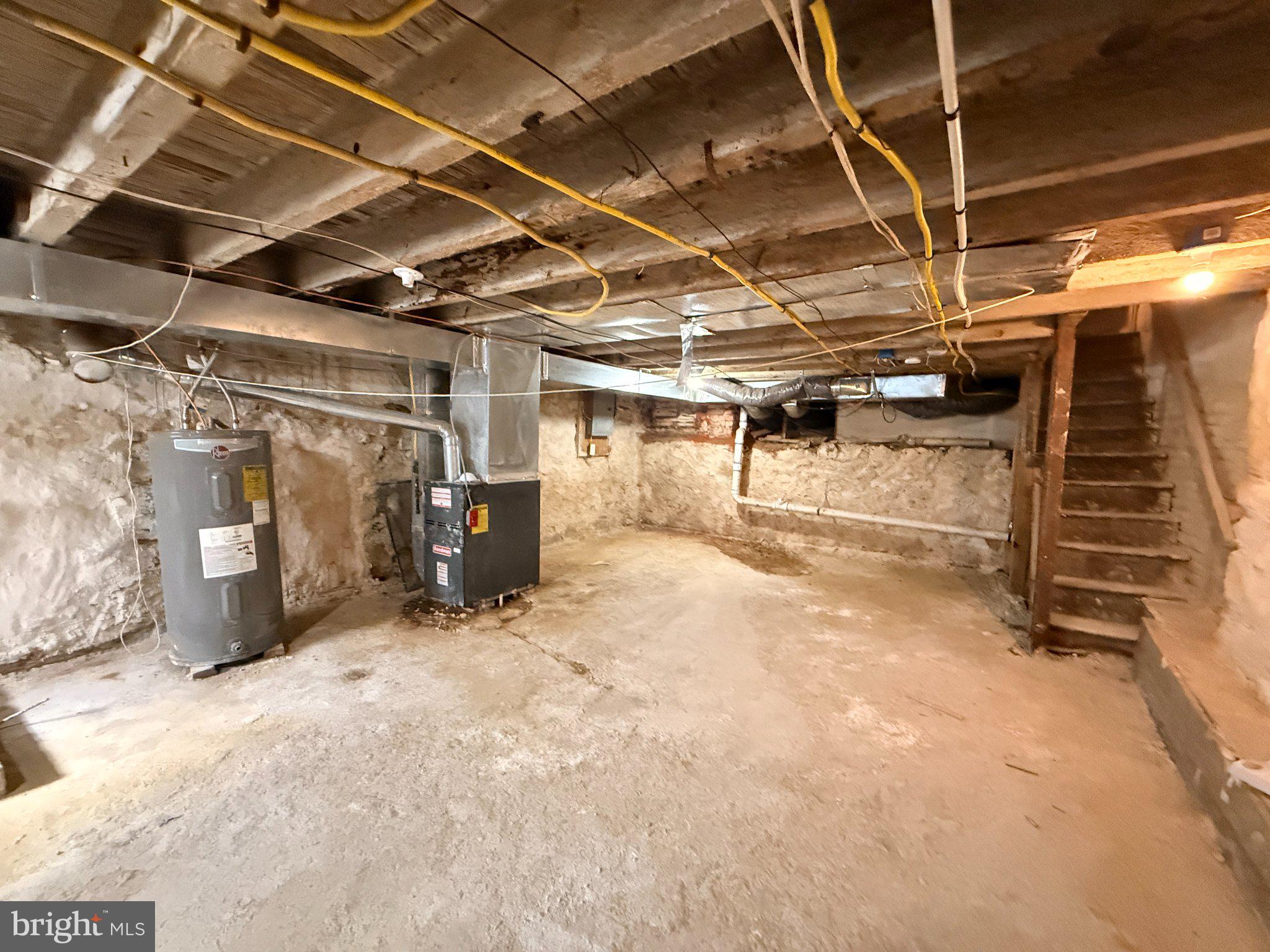 1003 Madison Street Chester, PA 19013 - Photo 24 of 30 a view of empty room with wooden walls