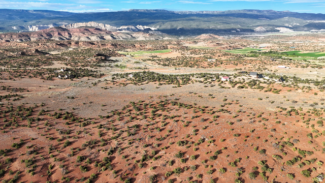 358 South Sky Drive Torrey, UT 84775 - Photo 66 of 82 Expansive desert landscape featuring natural rock formations and distant mountain ranges