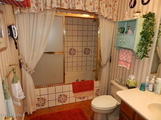 471 Camino Providencia Rio Rico, AZ 85648 - Photo 44 of 49 a bathroom with a sink toilet and shower