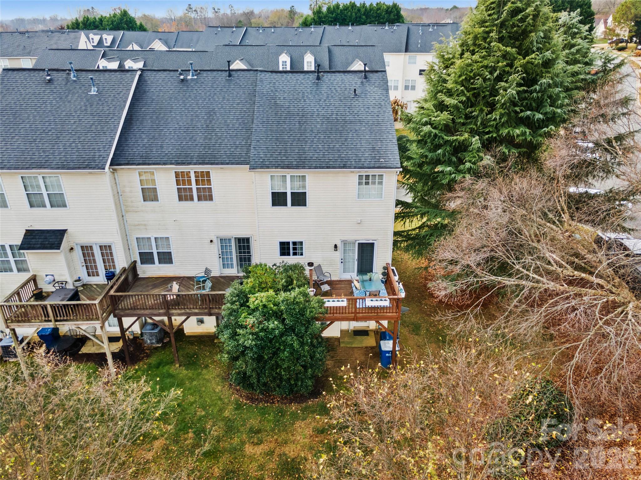 101 Rock Ridge Lane Mount Holly, NC 28120 - Photo 29 of 35 an aerial view of a house with garden space and sitting area