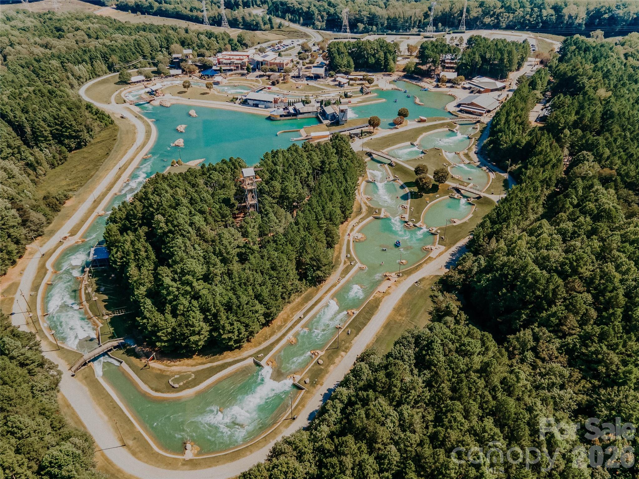101 Rock Ridge Lane Mount Holly, NC 28120 - Photo 33 of 35 a view of a lake with a park