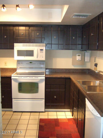 4201 East Camelback Road, Unit 101 Phoenix, AZ 85018 - Photo 4 of 11 04 Camelback Kitchen 2