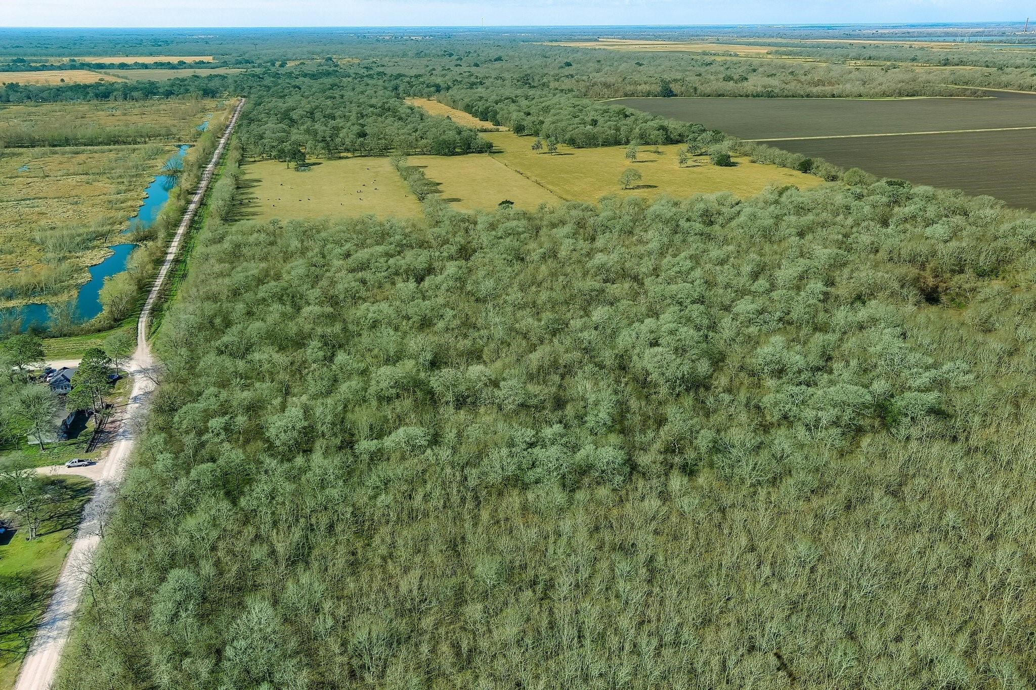 Tbd Tbd Tr Guy, TX 77444 - Photo 18 of 21 a view of a lake with a mountain