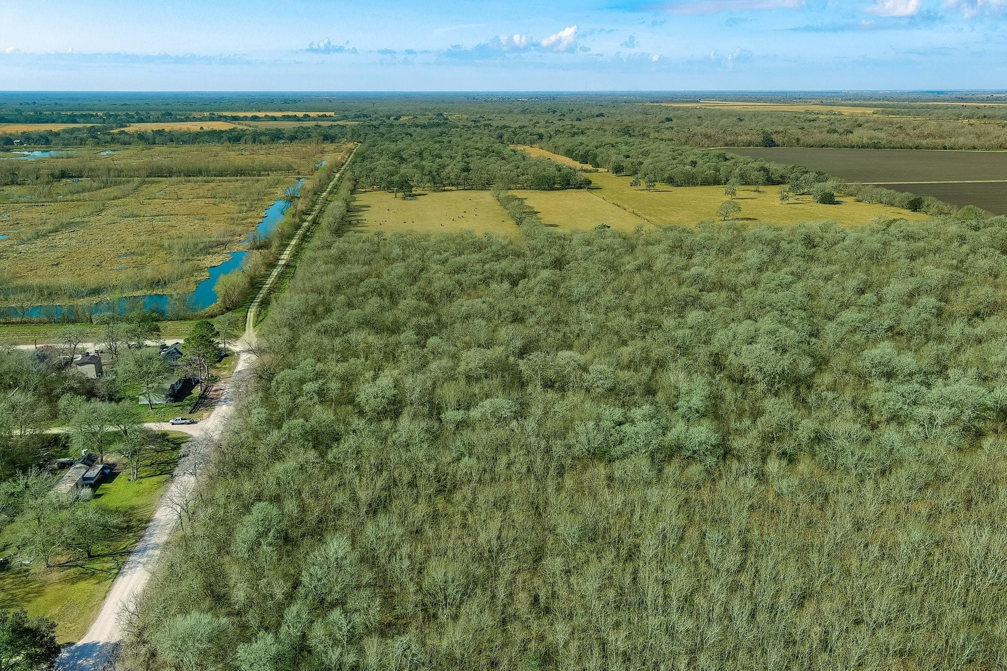 Tbd Tbd Tr Guy, TX 77444 - Photo 20 of 21 a view of a city with an ocean