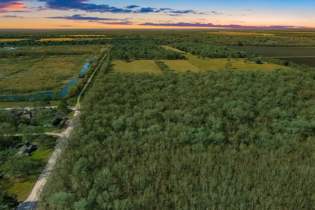 a view of lake with green space