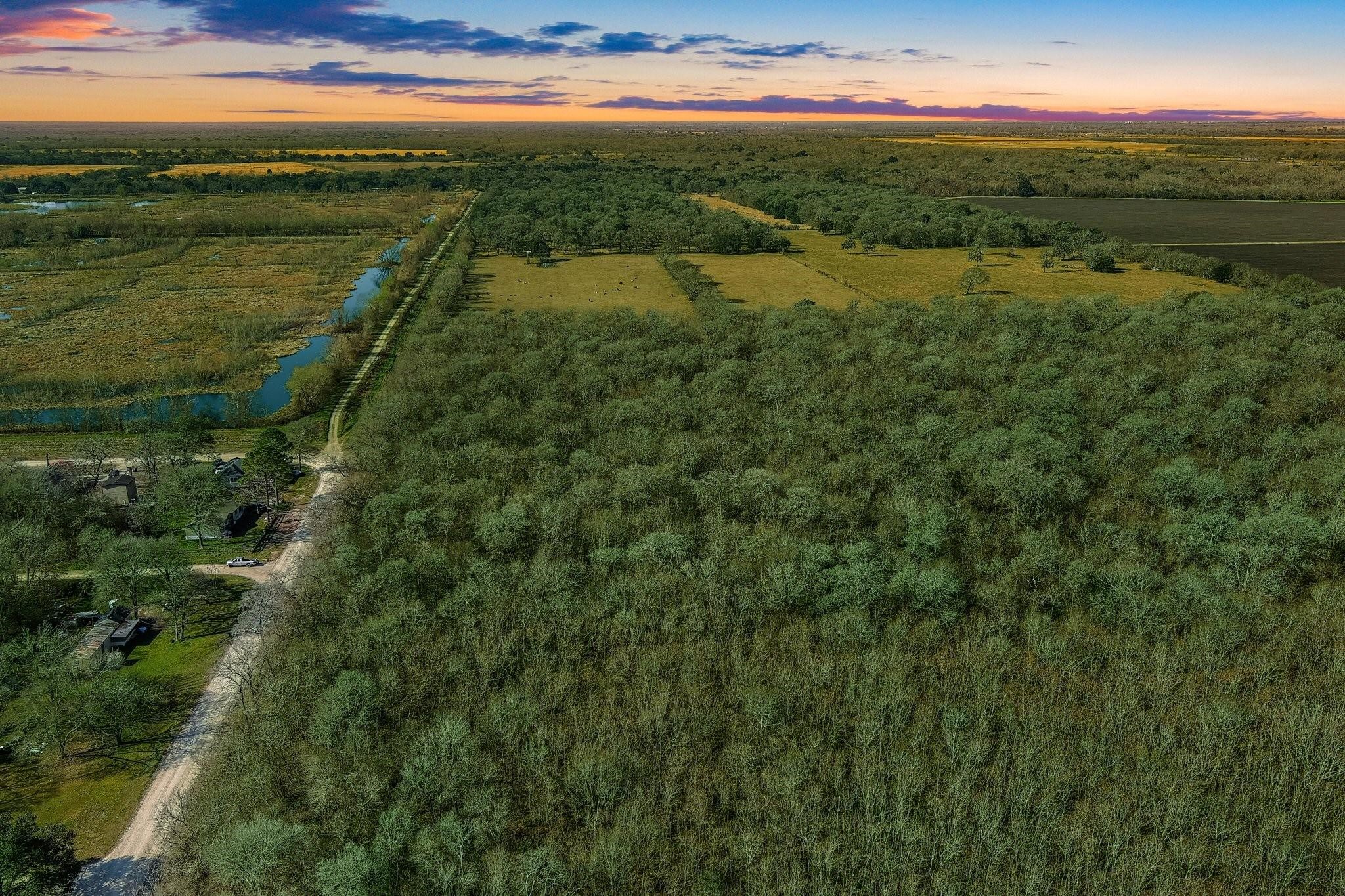 Tbd Tbd Tr Guy, TX 77444 - Photo 3 of 21 a view of lake with green space