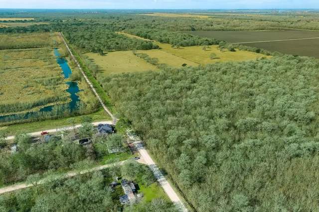 a view of a yard with a lake