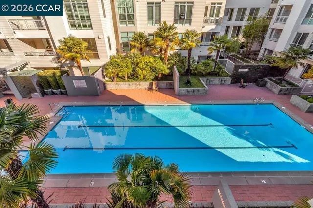 a room with pool table and outdoor seating