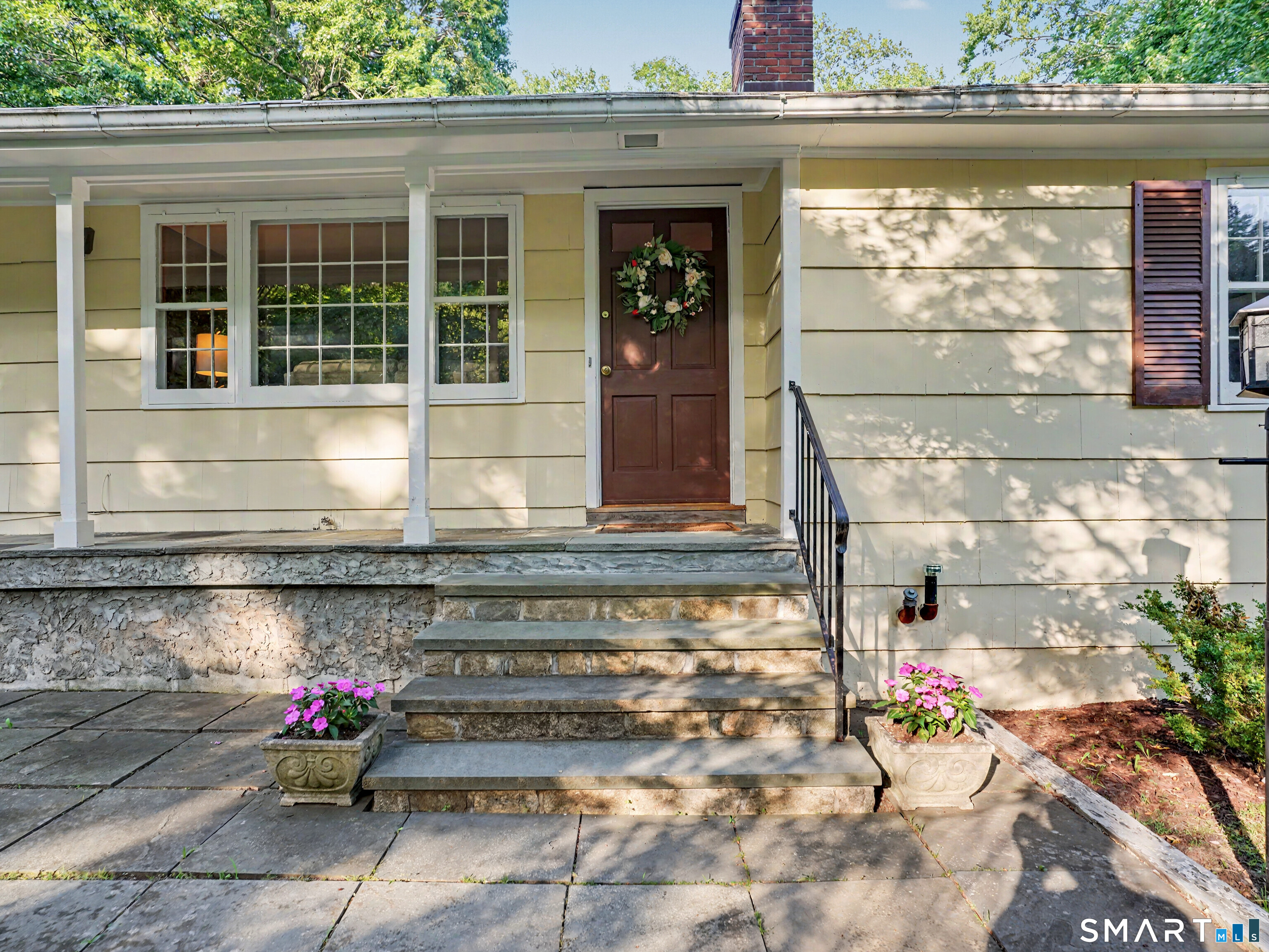 15 Flat Rock Drive Ridgefield, CT 06877 - Photo 3 of 39 a view of entrance door of the house