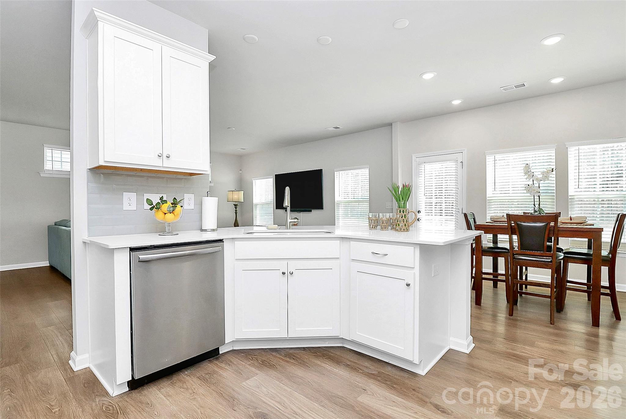 5766 Soft Shell Drive Lancaster, SC 29720 - Photo 13 of 33 a kitchen with white cabinets and sink