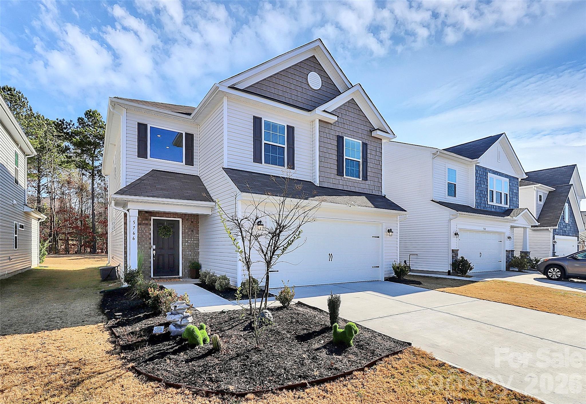 5766 Soft Shell Drive Lancaster, SC 29720 - Photo 2 of 33 a front view of a house with a yard