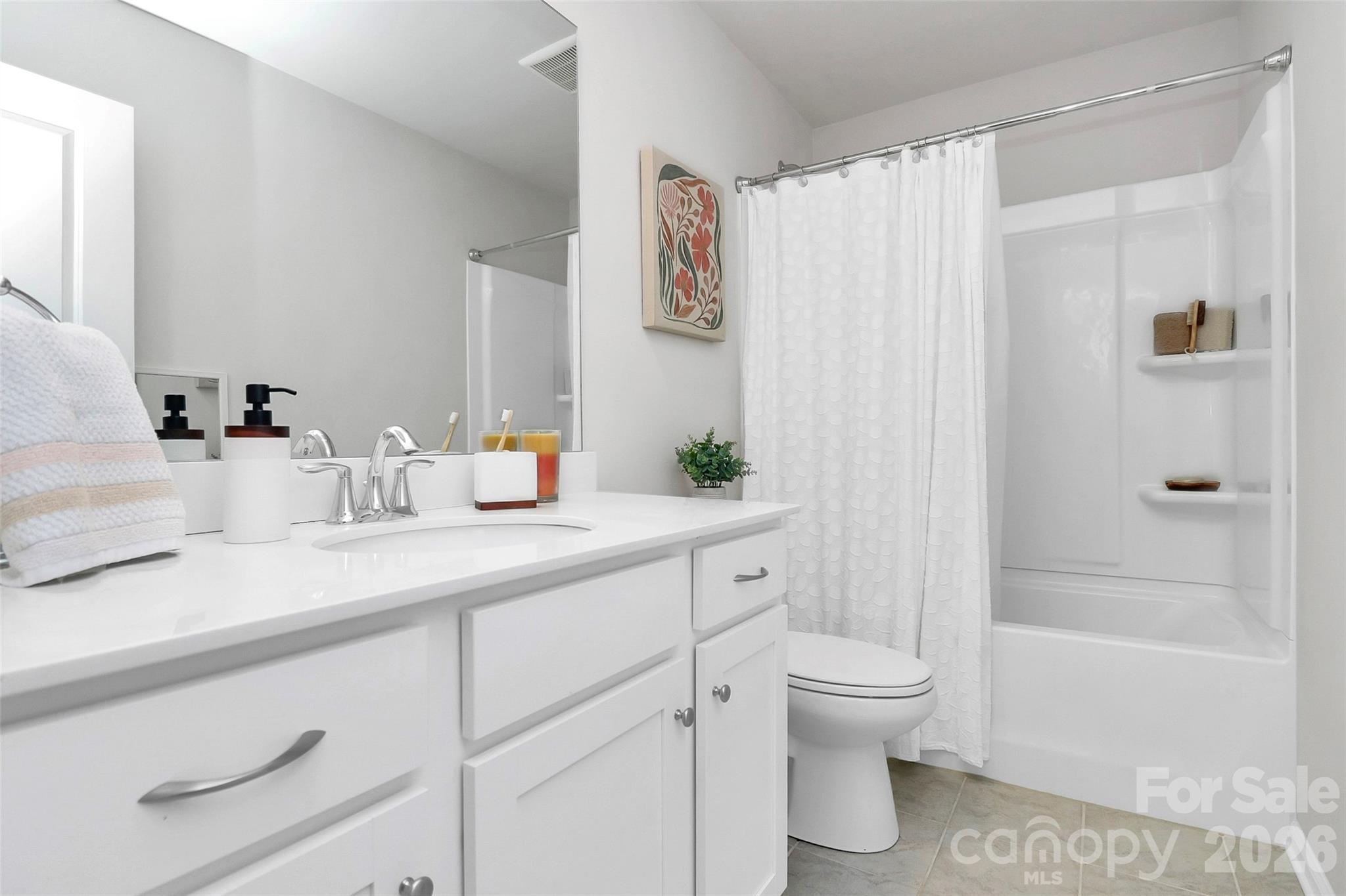 5766 Soft Shell Drive Lancaster, SC 29720 - Photo 22 of 33 a bathroom with a sink a toilet and shower