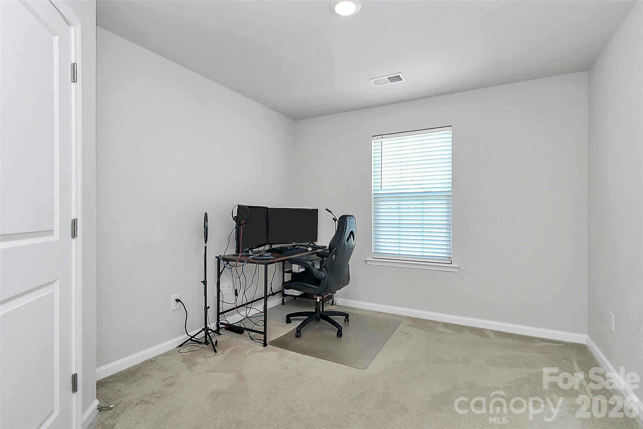 5766 Soft Shell Drive Lancaster, SC 29720 - Photo 24 of 33 a view of a workspace with furniture and a window