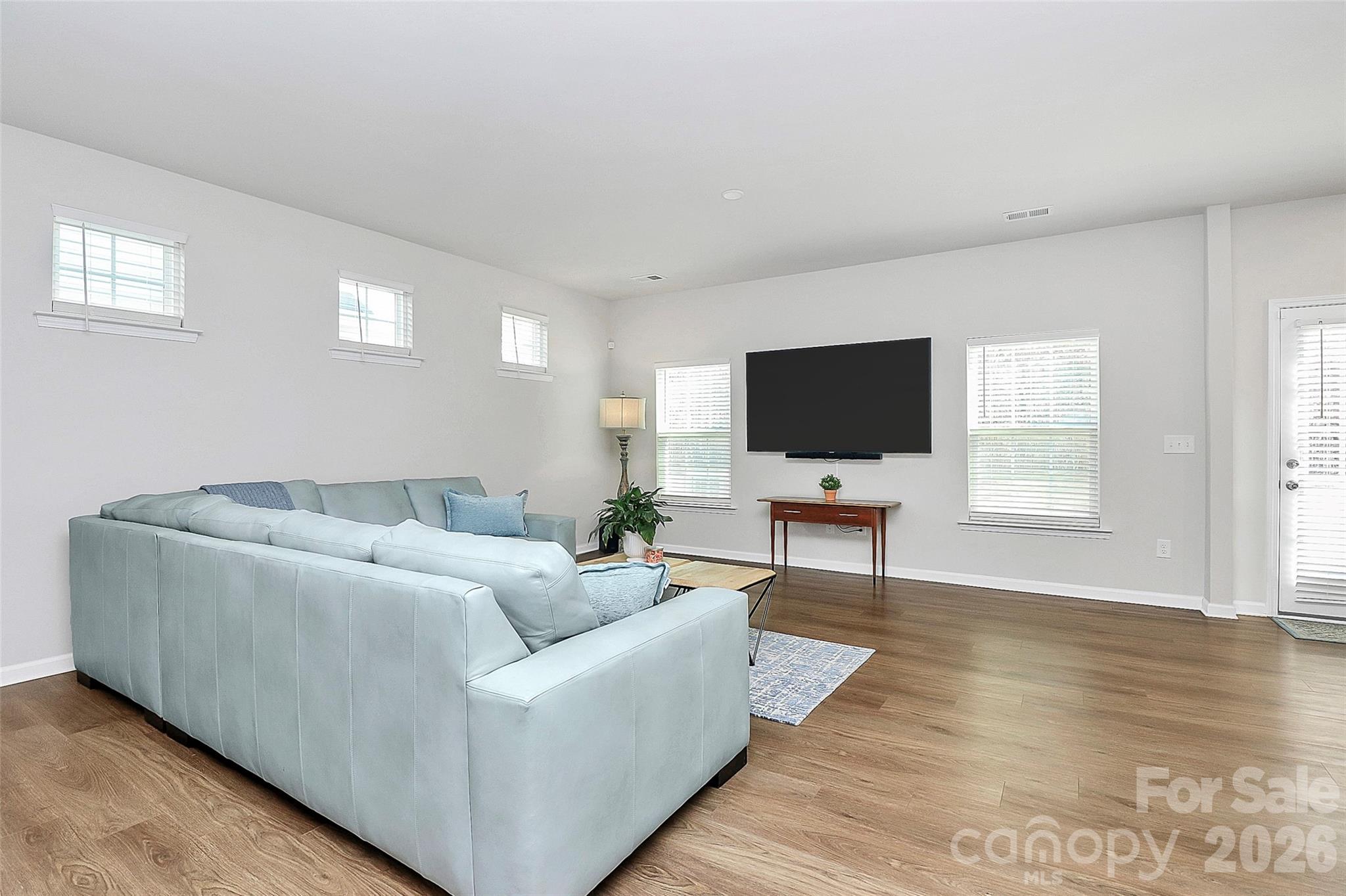 5766 Soft Shell Drive Lancaster, SC 29720 - Photo 5 of 33 a living room with furniture and a flat screen tv