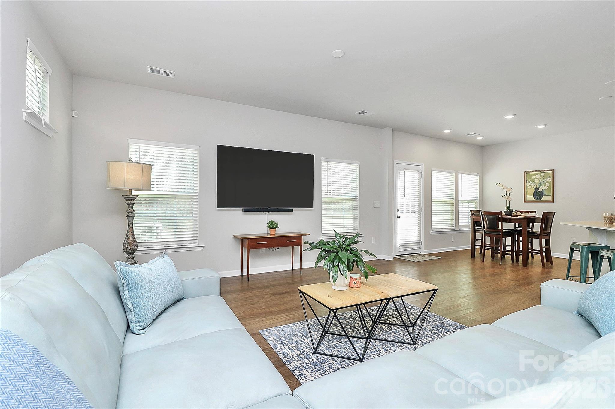 5766 Soft Shell Drive Lancaster, SC 29720 - Photo 7 of 33 a living room with furniture and a flat screen tv