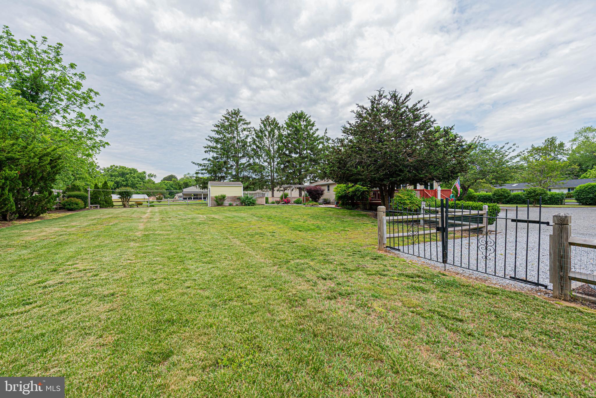 31468 Wingate Road Dagsboro, DE 19939 - Photo 41 of 48 a view of yard with swimming pool and green space