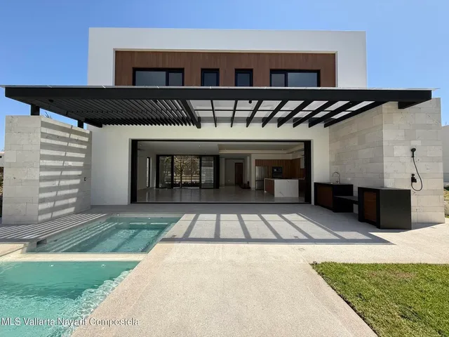 a view of a house with a patio