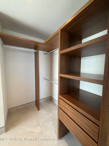 a view of room with cabinets