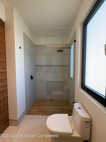 a view of a swimming pool with an outdoor seating