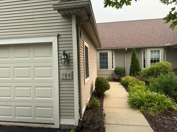 $450,000 | 208 Pierce Lake Drive, Chelsea, MI 48118