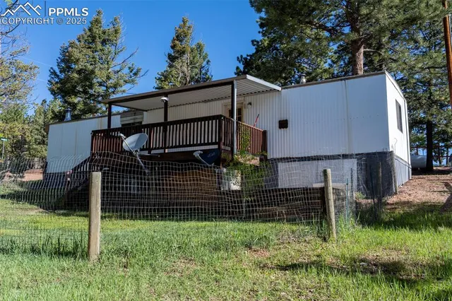 a view of backyard with green space