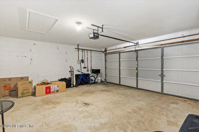 a view of a garage with storage