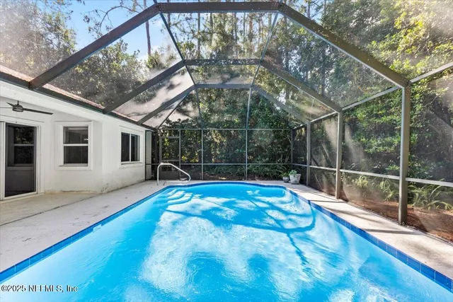 a view of a backyard with a patio