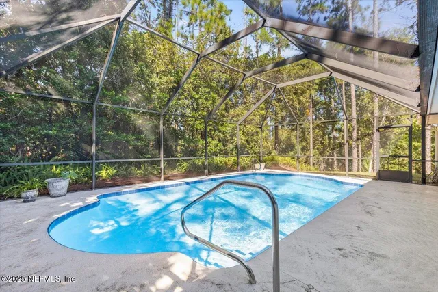 a view of outdoor space and swimming pool