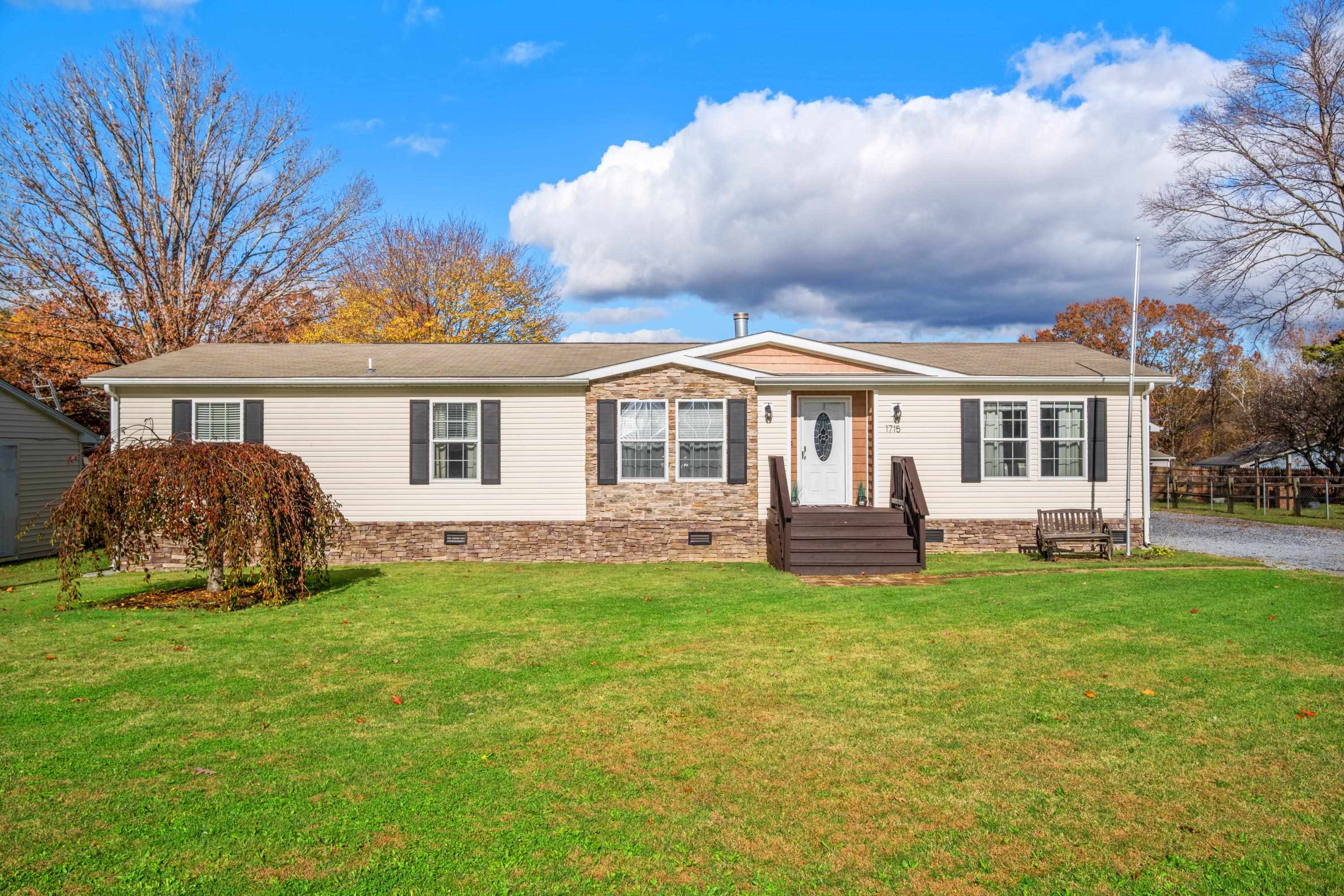 1715 3rd Street Waynesboro, VA 22980 - Photo 1 of 33 a view of a house with a yard and sitting area