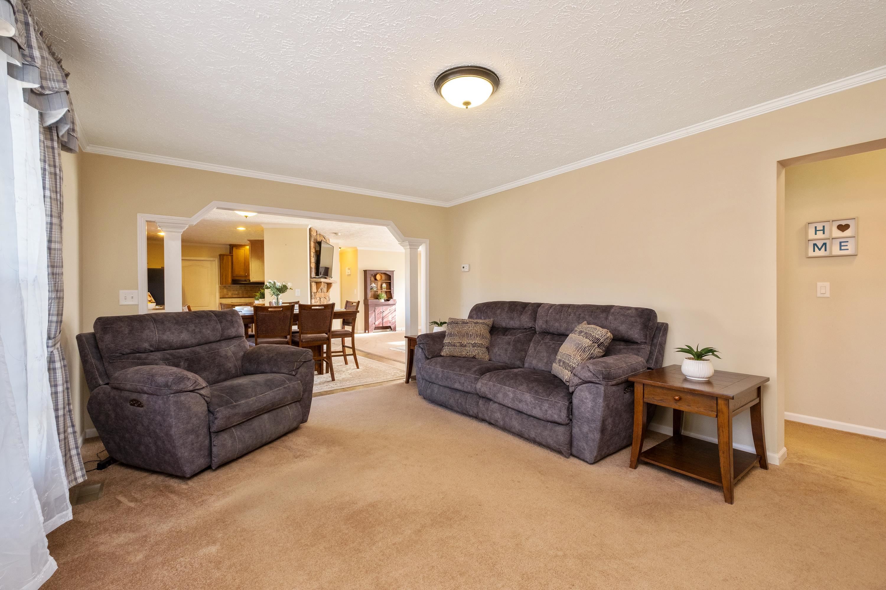 1715 3rd Street Waynesboro, VA 22980 - Photo 15 of 33 a living room with couches and a flat screen tv